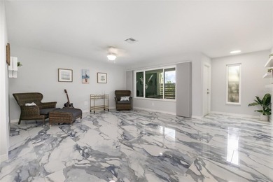 DISCOVER THE WATERFRONT LIFESTYLE YOU'VE BEEN DREAMING OF on El Rio Golf Course and Club in Florida - for sale on GolfHomes.com, golf home, golf lot