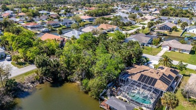 Build Your Waterfront Dream in Paradise! Take this opportunity on Palm Harbor Golf Club in Florida - for sale on GolfHomes.com, golf home, golf lot