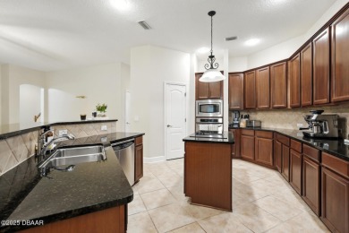 Wake up to the peaceful calm of preserve views, spend your days on Grand Haven Golf Club in Florida - for sale on GolfHomes.com, golf home, golf lot