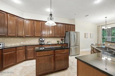 Wake up to the peaceful calm of preserve views, spend your days on Grand Haven Golf Club in Florida - for sale on GolfHomes.com, golf home, golf lot