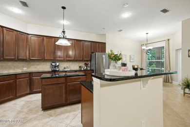 Wake up to the peaceful calm of preserve views, spend your days on Grand Haven Golf Club in Florida - for sale on GolfHomes.com, golf home, golf lot