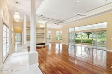 Welcome to your dream home in the highly sought-after gated on Magnolia Point Golf and Country Club in Florida - for sale on GolfHomes.com, golf home, golf lot