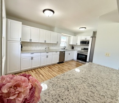 Your new home is a charming ranch nestled in a great on Currie Park Golf Club in Wisconsin - for sale on GolfHomes.com, golf home, golf lot