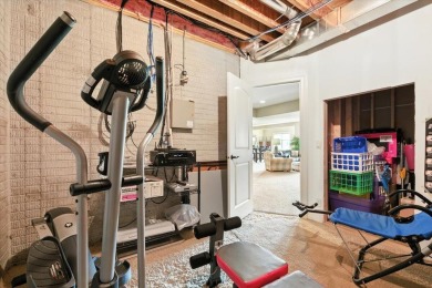 This executive custom  home is located on an extra large lot on Fox Run Golf Course in Iowa - for sale on GolfHomes.com, golf home, golf lot