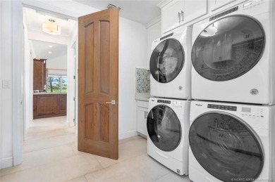 Stunning home situated in a peaceful cul-de-sac is perfectly on Sailfish Point Golf Club, Inc. in Florida - for sale on GolfHomes.com, golf home, golf lot