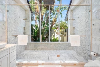 Stunning home situated in a peaceful cul-de-sac is perfectly on Sailfish Point Golf Club, Inc. in Florida - for sale on GolfHomes.com, golf home, golf lot