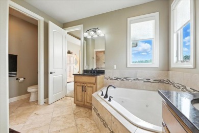 This executive custom  home is located on an extra large lot on Fox Run Golf Course in Iowa - for sale on GolfHomes.com, golf home, golf lot
