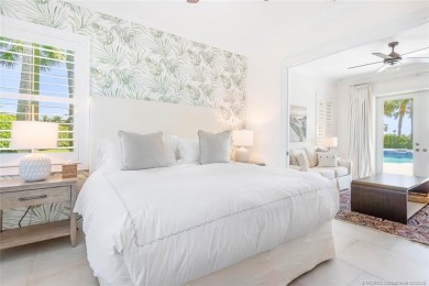 Stunning home situated in a peaceful cul-de-sac is perfectly on Sailfish Point Golf Club, Inc. in Florida - for sale on GolfHomes.com, golf home, golf lot