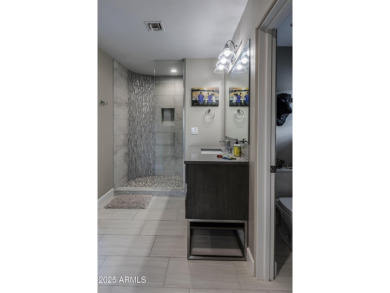 This beautifully updated Contemporary Southwest residence offers on Troon Country Club in Arizona - for sale on GolfHomes.com, golf home, golf lot