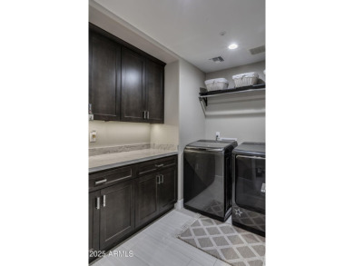 This beautifully updated Contemporary Southwest residence offers on Troon Country Club in Arizona - for sale on GolfHomes.com, golf home, golf lot