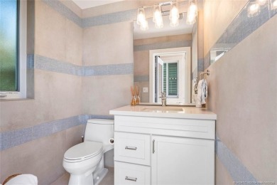 Stunning home situated in a peaceful cul-de-sac is perfectly on Sailfish Point Golf Club, Inc. in Florida - for sale on GolfHomes.com, golf home, golf lot
