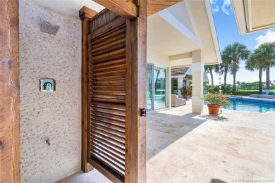 Stunning home situated in a peaceful cul-de-sac is perfectly on Sailfish Point Golf Club, Inc. in Florida - for sale on GolfHomes.com, golf home, golf lot