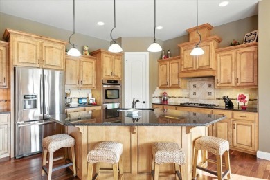 This executive custom  home is located on an extra large lot on Fox Run Golf Course in Iowa - for sale on GolfHomes.com, golf home, golf lot