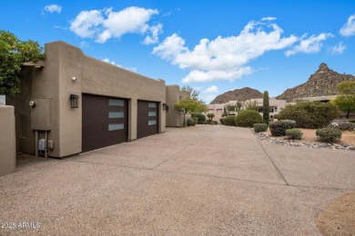 This beautifully updated Contemporary Southwest residence offers on Troon Country Club in Arizona - for sale on GolfHomes.com, golf home, golf lot