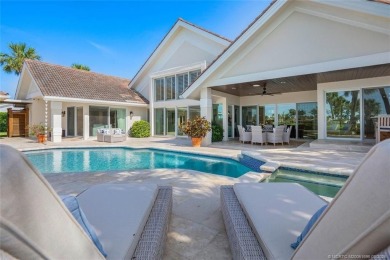 Stunning home situated in a peaceful cul-de-sac is perfectly on Sailfish Point Golf Club, Inc. in Florida - for sale on GolfHomes.com, golf home, golf lot