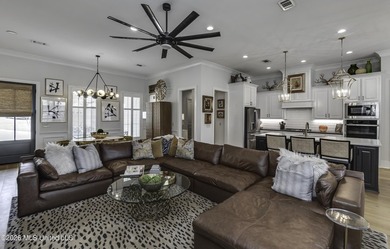 Experience resort style living in this beautifully appointed on Lake Caroline Golf Club in Mississippi - for sale on GolfHomes.com, golf home, golf lot