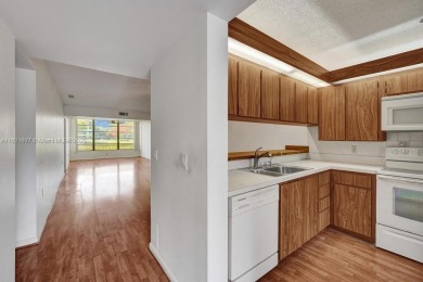 Spacious and maintained 2 bedroom, 2 bathroom Whitehall condo in on Pine Island Ridge Country Club in Florida - for sale on GolfHomes.com, golf home, golf lot