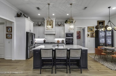 Experience resort style living in this beautifully appointed on Lake Caroline Golf Club in Mississippi - for sale on GolfHomes.com, golf home, golf lot