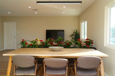 This 3 bd, 2 ba mid-century ranch home is located on a on El Dorado Park Golf Course in California - for sale on GolfHomes.com, golf home, golf lot