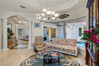 Discover island living at its finest in this elegant 4-bedroom on The Sanctuary Golf Club in Florida - for sale on GolfHomes.com, golf home, golf lot