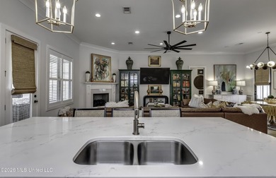 Experience resort style living in this beautifully appointed on Lake Caroline Golf Club in Mississippi - for sale on GolfHomes.com, golf home, golf lot