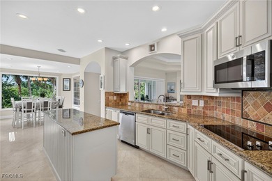 Discover island living at its finest in this elegant 4-bedroom on The Sanctuary Golf Club in Florida - for sale on GolfHomes.com, golf home, golf lot