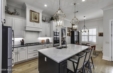 Experience resort style living in this beautifully appointed on Lake Caroline Golf Club in Mississippi - for sale on GolfHomes.com, golf home, golf lot