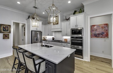 Experience resort style living in this beautifully appointed on Lake Caroline Golf Club in Mississippi - for sale on GolfHomes.com, golf home, golf lot