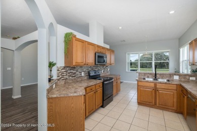 Great Location! Nicely Kept 3 Bedroom, 2 Full Bath, 2 Car Garage on Rivard Golf and Country Club in Florida - for sale on GolfHomes.com, golf home, golf lot