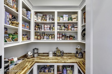 Experience resort style living in this beautifully appointed on Lake Caroline Golf Club in Mississippi - for sale on GolfHomes.com, golf home, golf lot