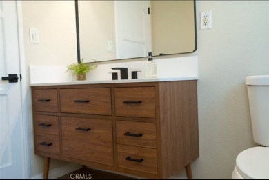 This 3 bd, 2 ba mid-century ranch home is located on a on El Dorado Park Golf Course in California - for sale on GolfHomes.com, golf home, golf lot