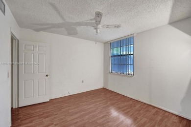 Spacious and maintained 2 bedroom, 2 bathroom Whitehall condo in on Pine Island Ridge Country Club in Florida - for sale on GolfHomes.com, golf home, golf lot