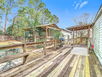 Welcome to this car enthusiasts perfect retreat!! This fantastic on Scotland Yards Golf Club in Florida - for sale on GolfHomes.com, golf home, golf lot