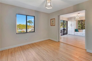 Gorgeous corner unit on the second floor with vaulted ceilings on Bentley Village Golf Course in Florida - for sale on GolfHomes.com, golf home, golf lot