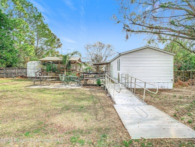 Welcome to this car enthusiasts perfect retreat!! This fantastic on Scotland Yards Golf Club in Florida - for sale on GolfHomes.com, golf home, golf lot