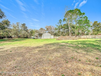 Welcome to this car enthusiasts perfect retreat!! This fantastic on Scotland Yards Golf Club in Florida - for sale on GolfHomes.com, golf home, golf lot