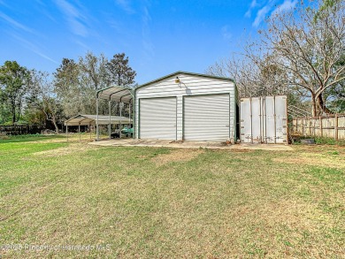 Welcome to this car enthusiasts perfect retreat!! This fantastic on Scotland Yards Golf Club in Florida - for sale on GolfHomes.com, golf home, golf lot