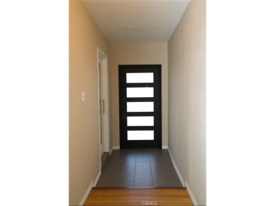 This 3 bd, 2 ba mid-century ranch home is located on a on El Dorado Park Golf Course in California - for sale on GolfHomes.com, golf home, golf lot