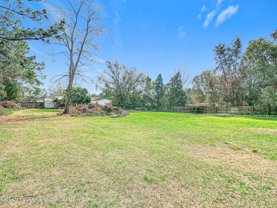 Welcome to this car enthusiasts perfect retreat!! This fantastic on Scotland Yards Golf Club in Florida - for sale on GolfHomes.com, golf home, golf lot