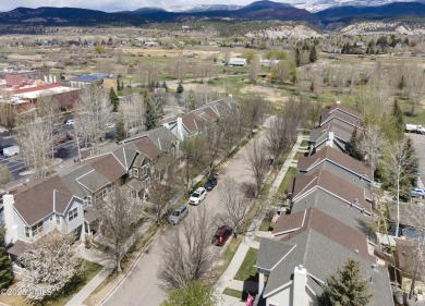 Nestled on a quintessential street in the heart of Eagle Ranch on Eagle Ranch in Colorado - for sale on GolfHomes.com, golf home, golf lot
