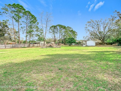 Welcome to this car enthusiasts perfect retreat!! This fantastic on Scotland Yards Golf Club in Florida - for sale on GolfHomes.com, golf home, golf lot