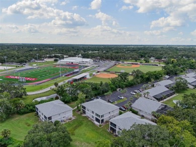 Discover this beautifully updated main floor condo 2-bedroom on Bobby Jones Golf Club in Florida - for sale on GolfHomes.com, golf home, golf lot