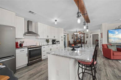 Welcome to this absolutely stunning 3-bedroom, 2-bath on Kings Gate Golf Club in Florida - for sale on GolfHomes.com, golf home, golf lot