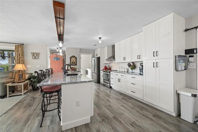 Welcome to this absolutely stunning 3-bedroom, 2-bath on Kings Gate Golf Club in Florida - for sale on GolfHomes.com, golf home, golf lot