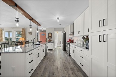 Welcome to this absolutely stunning 3-bedroom, 2-bath on Kings Gate Golf Club in Florida - for sale on GolfHomes.com, golf home, golf lot