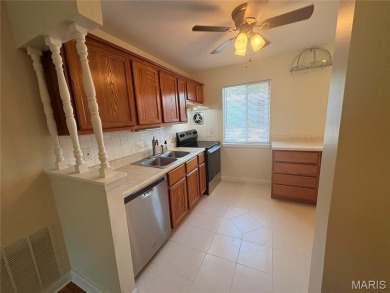 Ready to enjoy Lake Life?  Just move into this 2nd floor condo on Lake Saint Louis Par 3 in Missouri - for sale on GolfHomes.com, golf home, golf lot