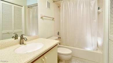 Enjoy sweeping golf and water views from this beautifully on Kelly Greens Golf and Country Club in Florida - for sale on GolfHomes.com, golf home, golf lot