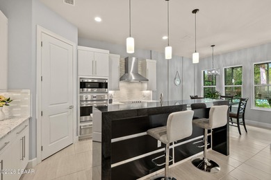 Welcome to this beautifully appointed 3-bedroom, 2-bath home on Plantation Bay Golf and Country Club in Florida - for sale on GolfHomes.com, golf home, golf lot