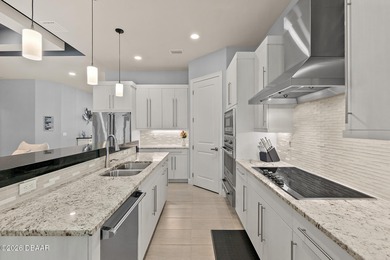 Welcome to this beautifully appointed 3-bedroom, 2-bath home on Plantation Bay Golf and Country Club in Florida - for sale on GolfHomes.com, golf home, golf lot