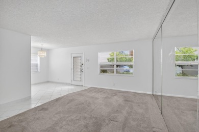 2 Bed / 2 Bath First floor unit in Kings Point Golf and Country on Kings Point Golf -Flanders Way in Florida - for sale on GolfHomes.com, golf home, golf lot